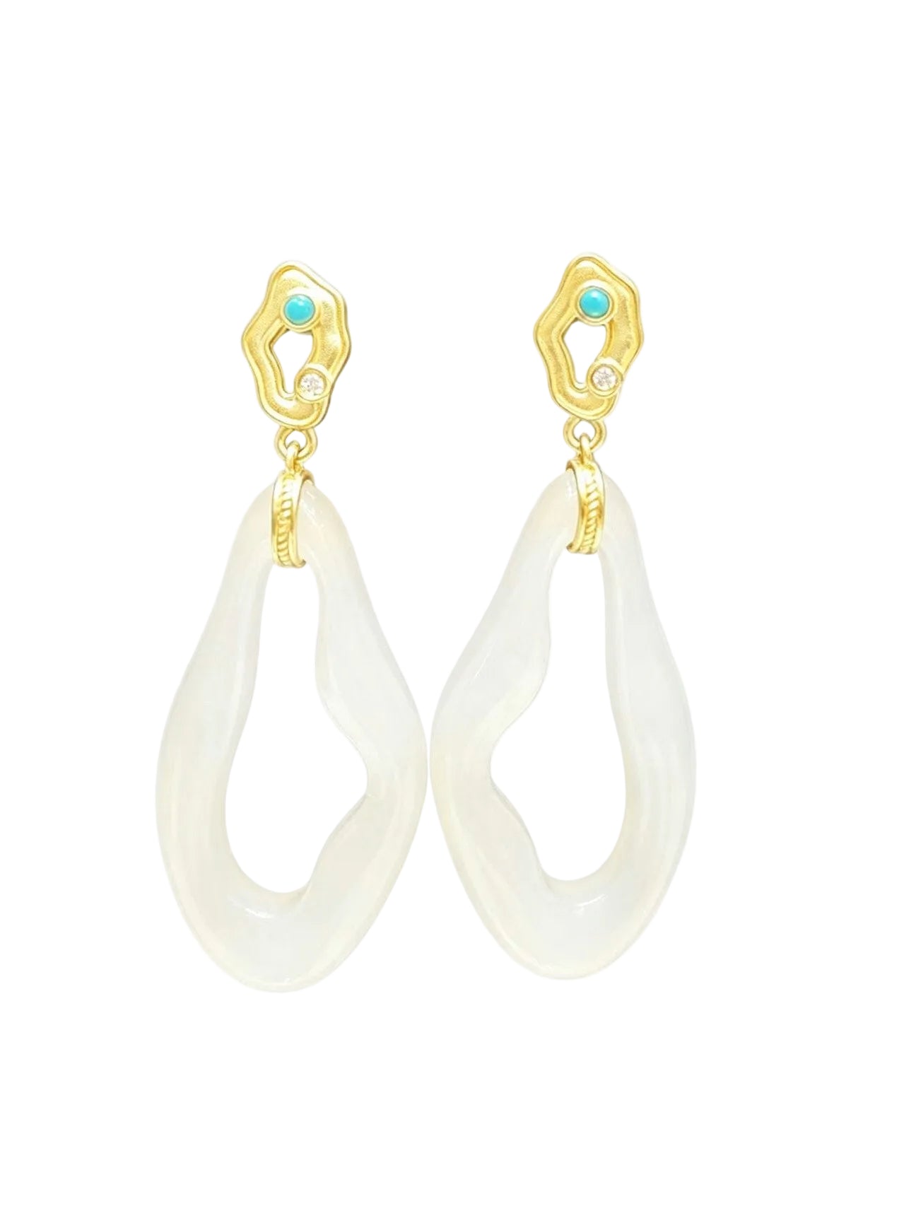 A pair of gold and white teardrop dangle earrings with small turquoise blue gemstone accents at the top, timeless.